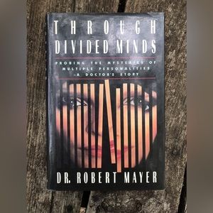 Through divided minds ,Dr.Robert Mayer
